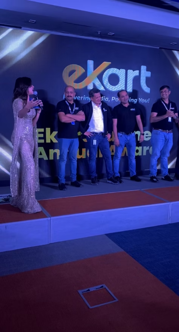 Host on stage at a corporate awards ceremony